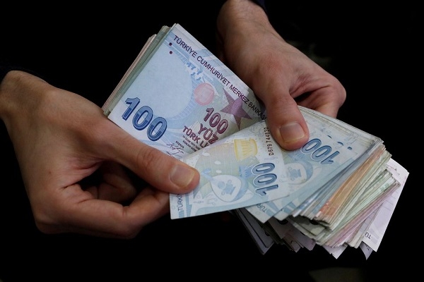 Turkish lira plummets to new low, dragging central bank to the rescue