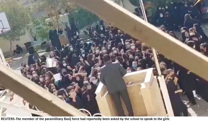 Iran protests: Schoolgirls heckle paramilitary speaker