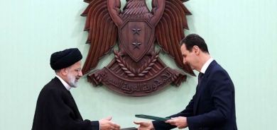 الأسد ورئيسي يدعوان لإنهاء كل أشكال 