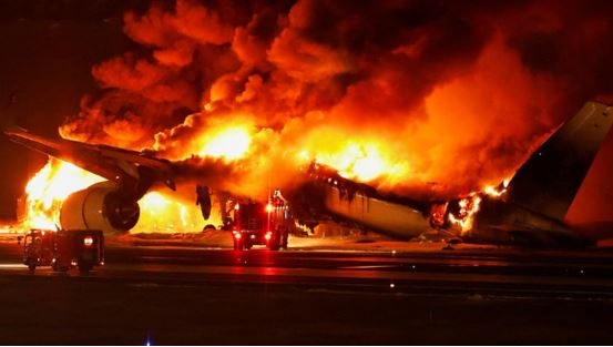 Japan Airlines Plane Bursts Into Flames at Haneda Airport