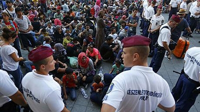 Migrants: angry scenes as hundreds stranded in Hungary