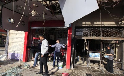 Suicide bombers storm Iraq ministry building, 24 killed