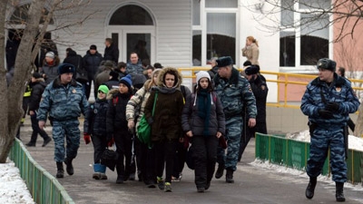 Teen gunman kills two in Moscow school siege 