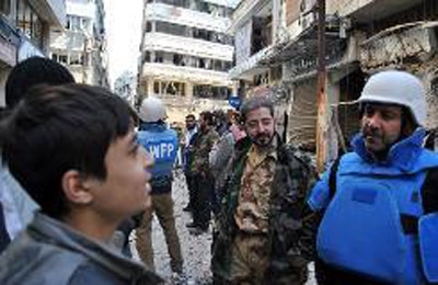 Dozens of Syrian civilians evacuated from Homs