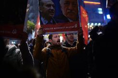 Turkey passes law to shut schools run by Erdogan arch-rival 