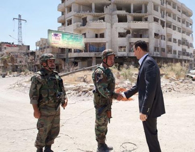 Amid carnage of war, Syria readies for Assad re-election
