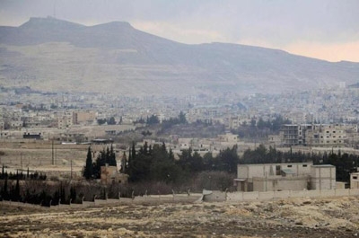 Syrian army captures strategic border town 