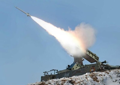 North Korea test-fires 16 rockets into sea