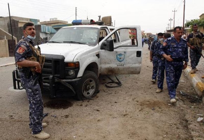 50 killed in bomb attack on rally, police and troops voting in Iraq