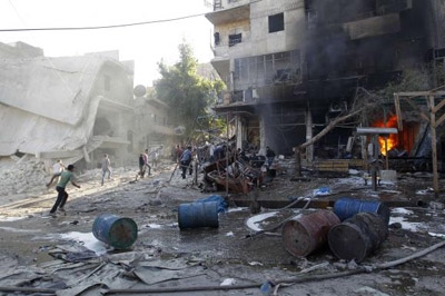  Air strike kills 33 in Syria's Aleppo: monitoring group