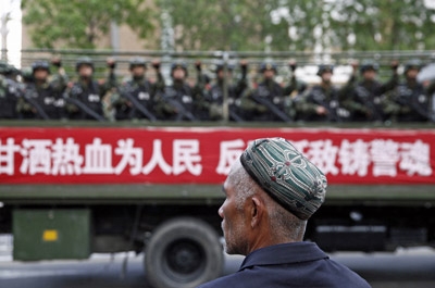 China sentences nine to death in Xinjiang 