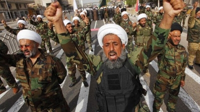 Iraq crisis: Shia militia show of force raises tensions