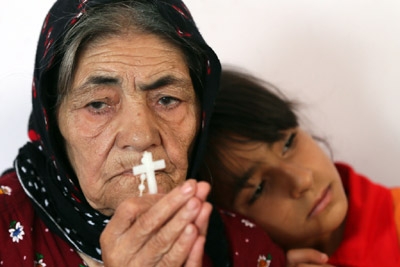 Iraqi Christians are caught in the middle and hitting the road