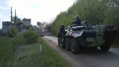 Ukraine forces attack rebel positions, Putin growls