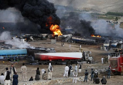 Taliban insurgents set oil tankers ablaze in Afghanistan