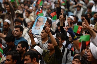 Afghan poll candidates feud on eve of results 