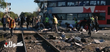 Passenger train, bus collide in Canada's capital, six dead