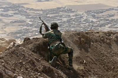 Iraq's Shi'ite militia, Kurds use U.S. air strikes to further own agendas