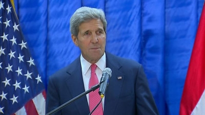 John Kerry says world cannot watch IS evil spread