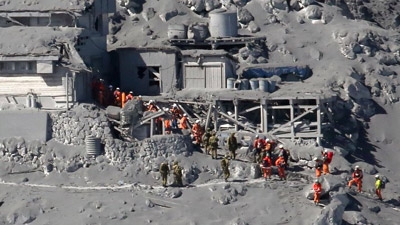 Dozens of hikers feared dead in Japanese volcano eruption