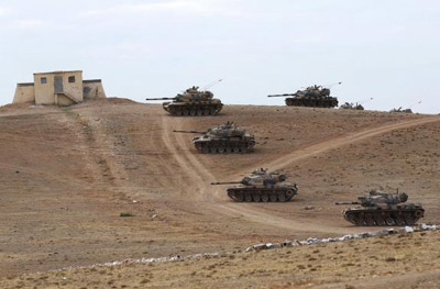 Turkey vows to fight Islamic State, coalition strikes near border