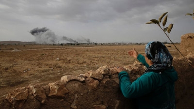 Activists: Kurds Halt Jihadi Advance in Syria Town