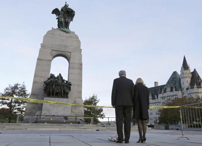 Canada's Harper pledges tougher security laws after attack