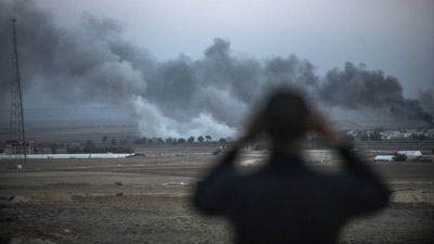 IS group bids to cuff off Kobane, Iraqi Kurds ready to join fight