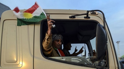 After many delays, first group of Iraqi peshmerga enter Kobane
