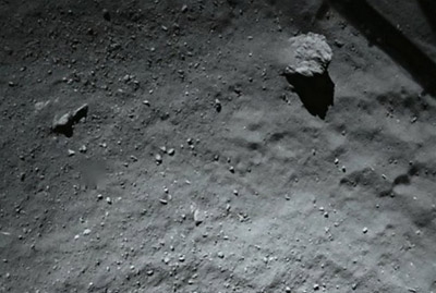 Probe makes historic comet landing