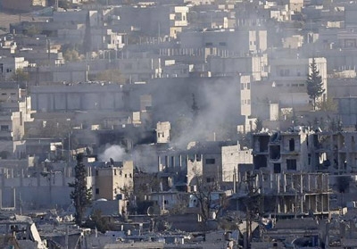 Monitors: Kurds Seize Islamic State Arms, Buildings in Kobani 
