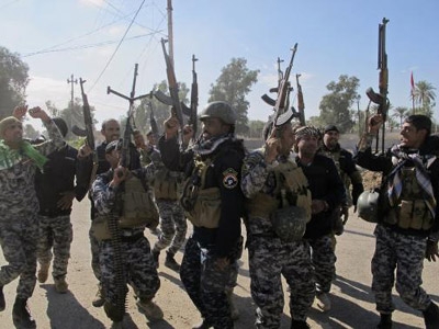 Islamic State fighters battle Iraqi forces near Baiji refinery