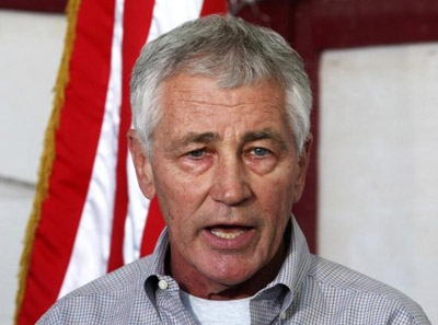 Iraq presses Hagel for more U.S. air strikes, weapons