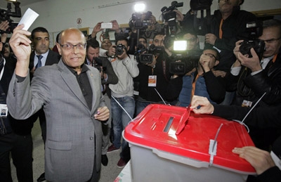 Tunisians Votes in Historic Presidential Runoff