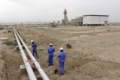 Iraq pins hope on privatisation as oil price falls and war against ISIL takes its toll