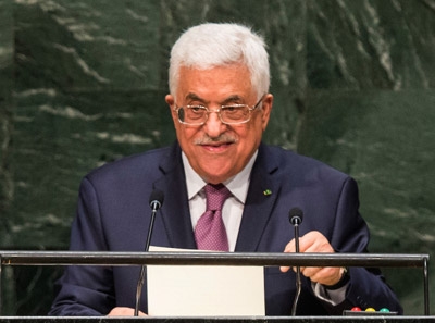Abbas signs ICC treaty after UN rejects statehood bid