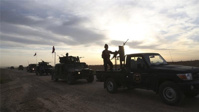 Iraqi forces tighten siege of Tikrit
