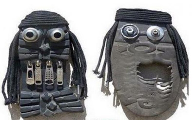 Iraqi artist shows 'ugly faces' of IS using old shoes