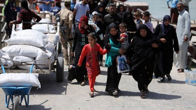 Anger mounts among Anbar’s displaced stalled at Baghdad’s gates