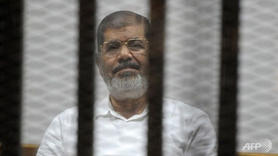 Egypt's ousted President Morsi jailed for 20 years