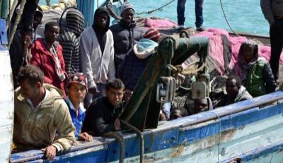 EU lawmakers demand migrant burden be shared