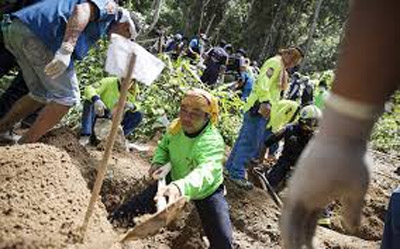 Malaysia says 139 bodies found in migrant graves