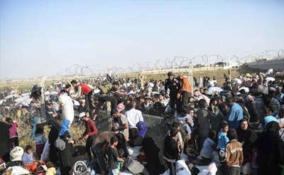 Turkey opens border to Syrian refugees fleeing Tal Abyad