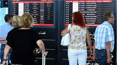 Foreign tourists fly out after Tunisia killings