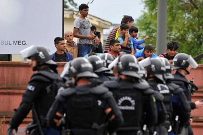 Police Use Tear Gas to Stop Fighting at Hungary Refugee Camp