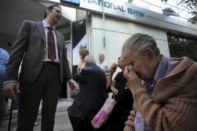 Greece in shock as banks shut after snap referendum call