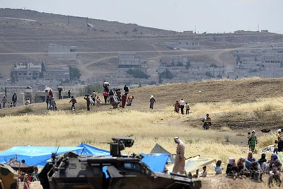  Kobani refugees return home as Kurds drive out ISIS 
