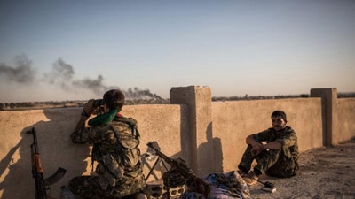 Syrian Kurds battle IS as US steps up air war