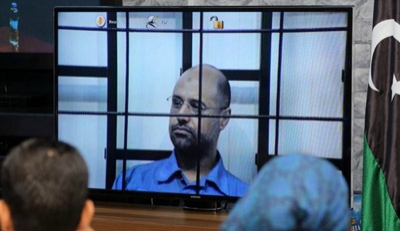 Libyan court sentences Gaddafi son Saif, eight other ex-officials to death