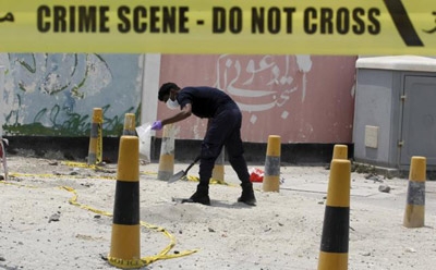 Bomb kills two policemen in worst Bahrain bombing in months